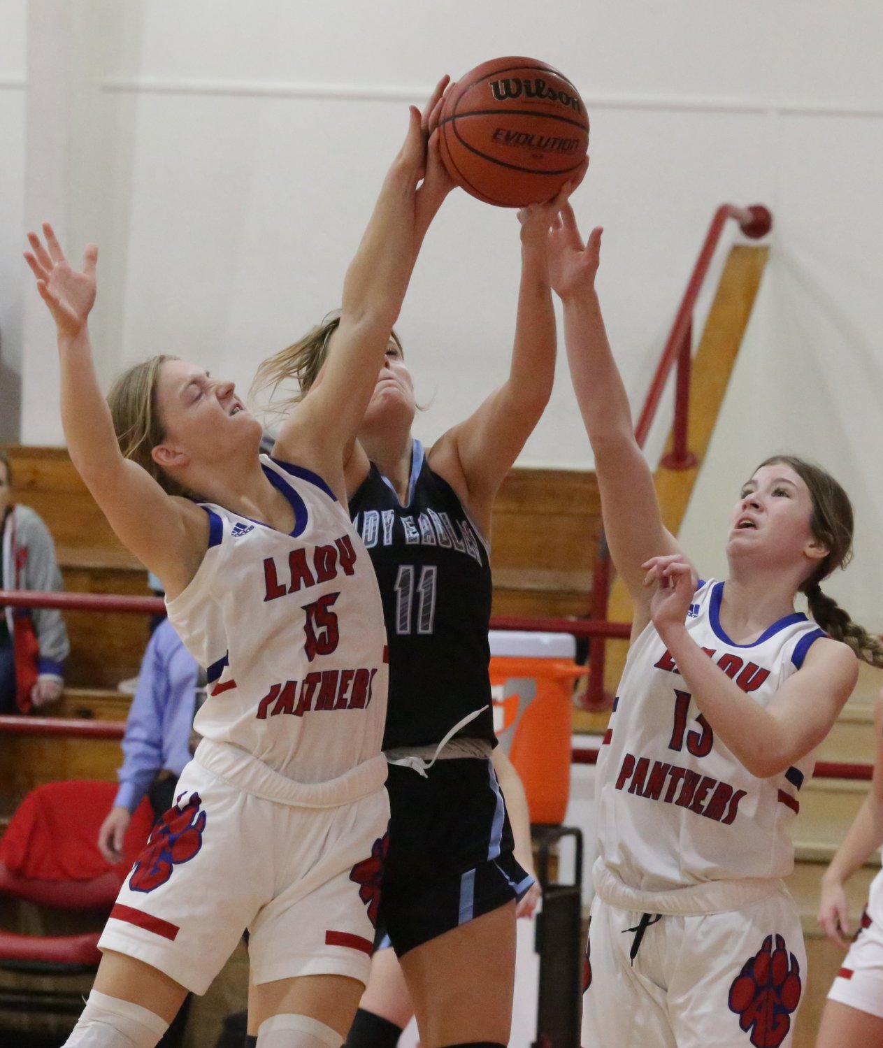 Lady Panthers Cacie Lennon and Laniey Teel compete for a rebound in action against Como-Pickton last Tuesday.